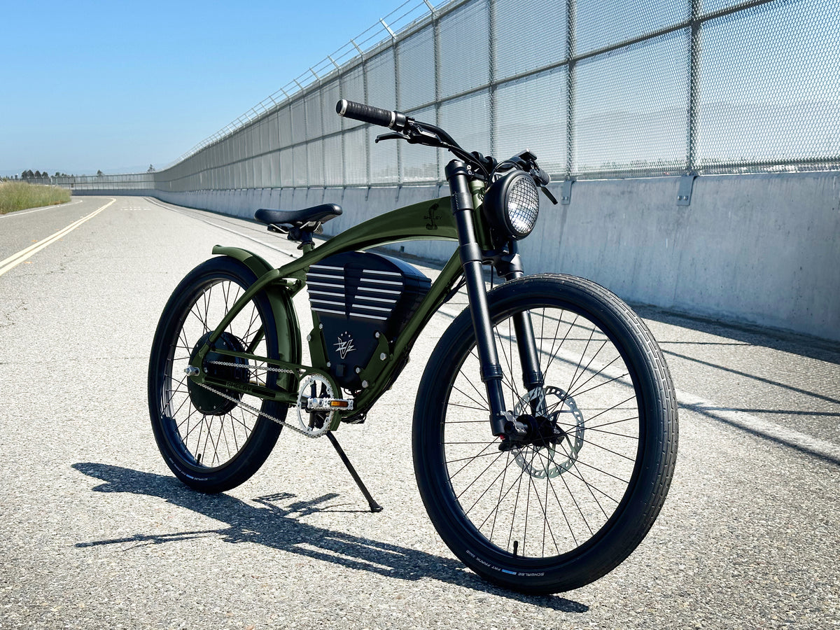 The Green Shelby beside a track barrier in California